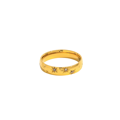 Ella Ring in 18K gold-plated stainless steel featuring engraved star details with sparkling crystal accents and a waterproof, tarnish-resistant finish.