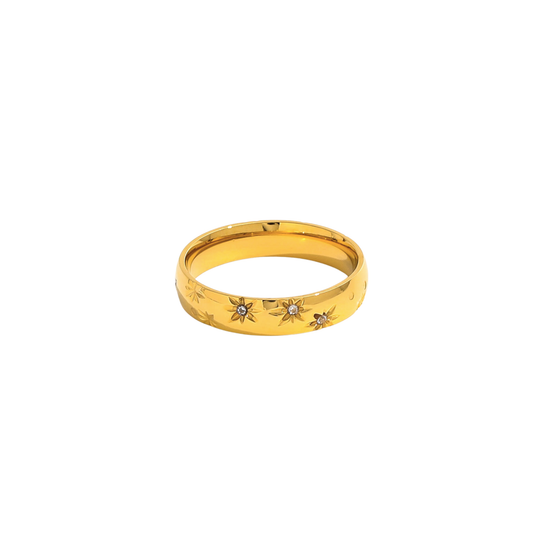 Ella Ring in 18K gold-plated stainless steel featuring engraved star details with sparkling crystal accents and a waterproof, tarnish-resistant finish.
