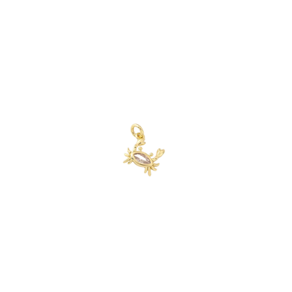 Gold crab charm with marquise-cut crystal centre on white background
