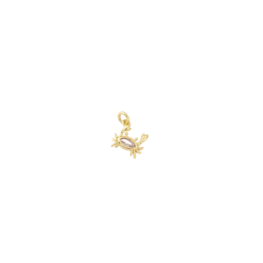 Gold crab charm with marquise-cut crystal centre on white background