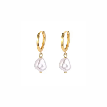 Gold hoop earrings with white pearl drops on a white background