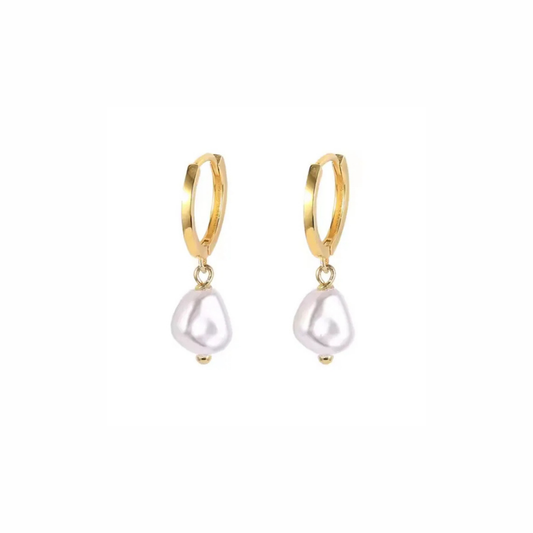 Gold hoop earrings with white pearl drops on a white background