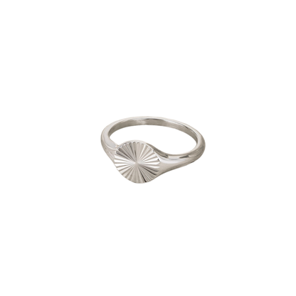 Solstice Signet Ring by KJAYDE in polished silver stainless steel with textured sunburst face