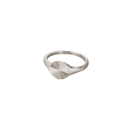 Solstice Signet Ring by KJAYDE in polished silver stainless steel with textured sunburst face