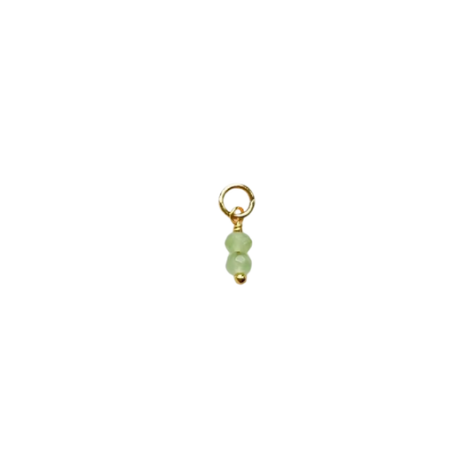 Gold-tone mint double bead charm with two light green beads on white background
