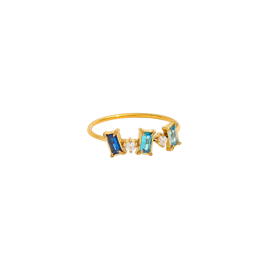 Gold baguette ring with blue stones, minimalist ocean-inspired stacking jewellery