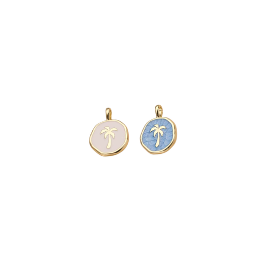 Gold-tone Palm Coast charms with blush and blue palm tree designs on white background