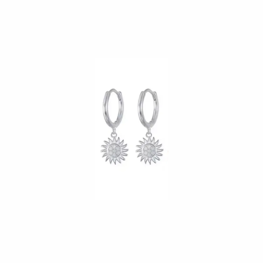 Sunburst silver huggie hoop earrings with radiant sun charm and pavé sparkle