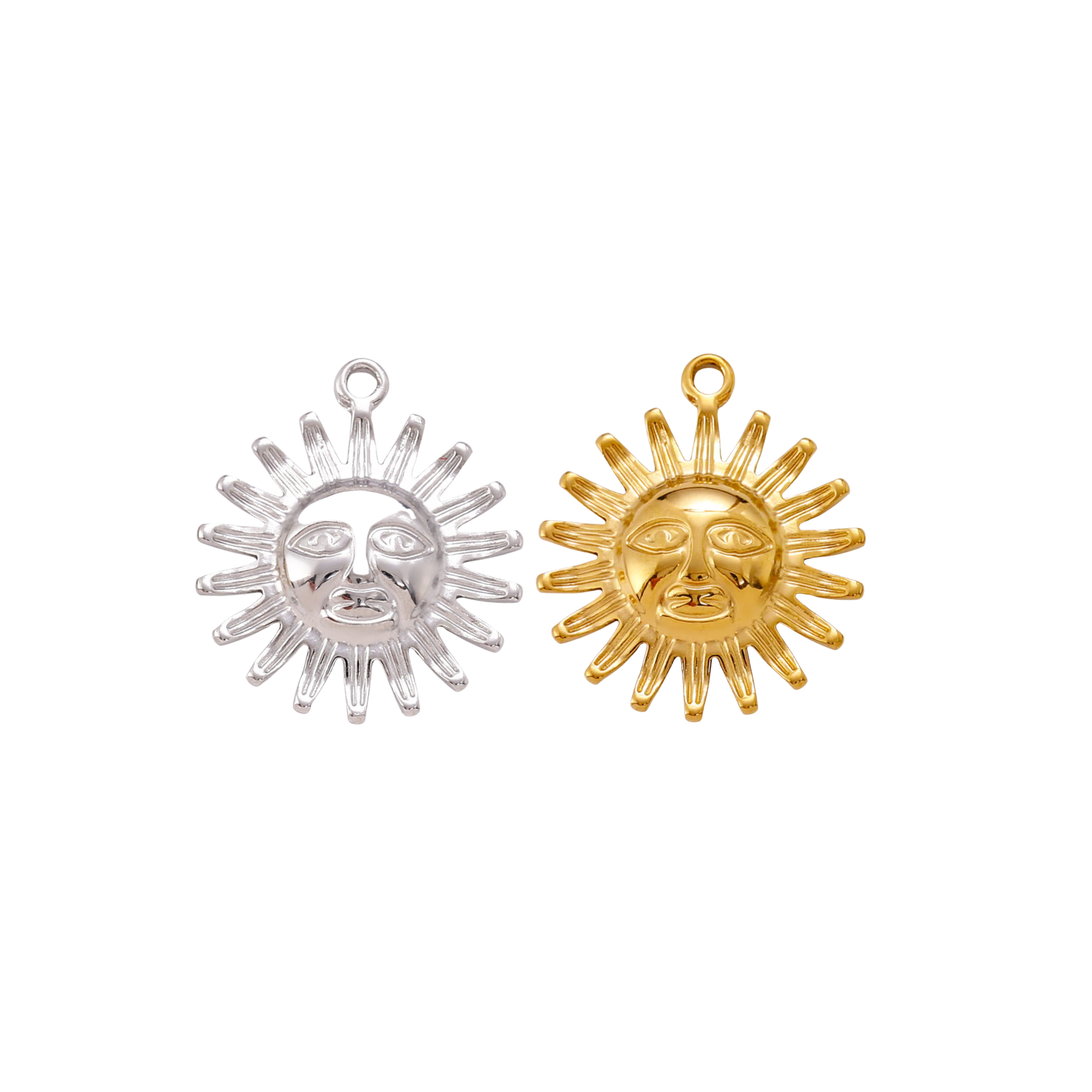 Gold and silver Solstice Sun Charm with celestial sun face design displayed side by side