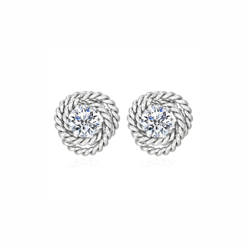 Pair of silver rope-style earrings with clear gemstones on a white background