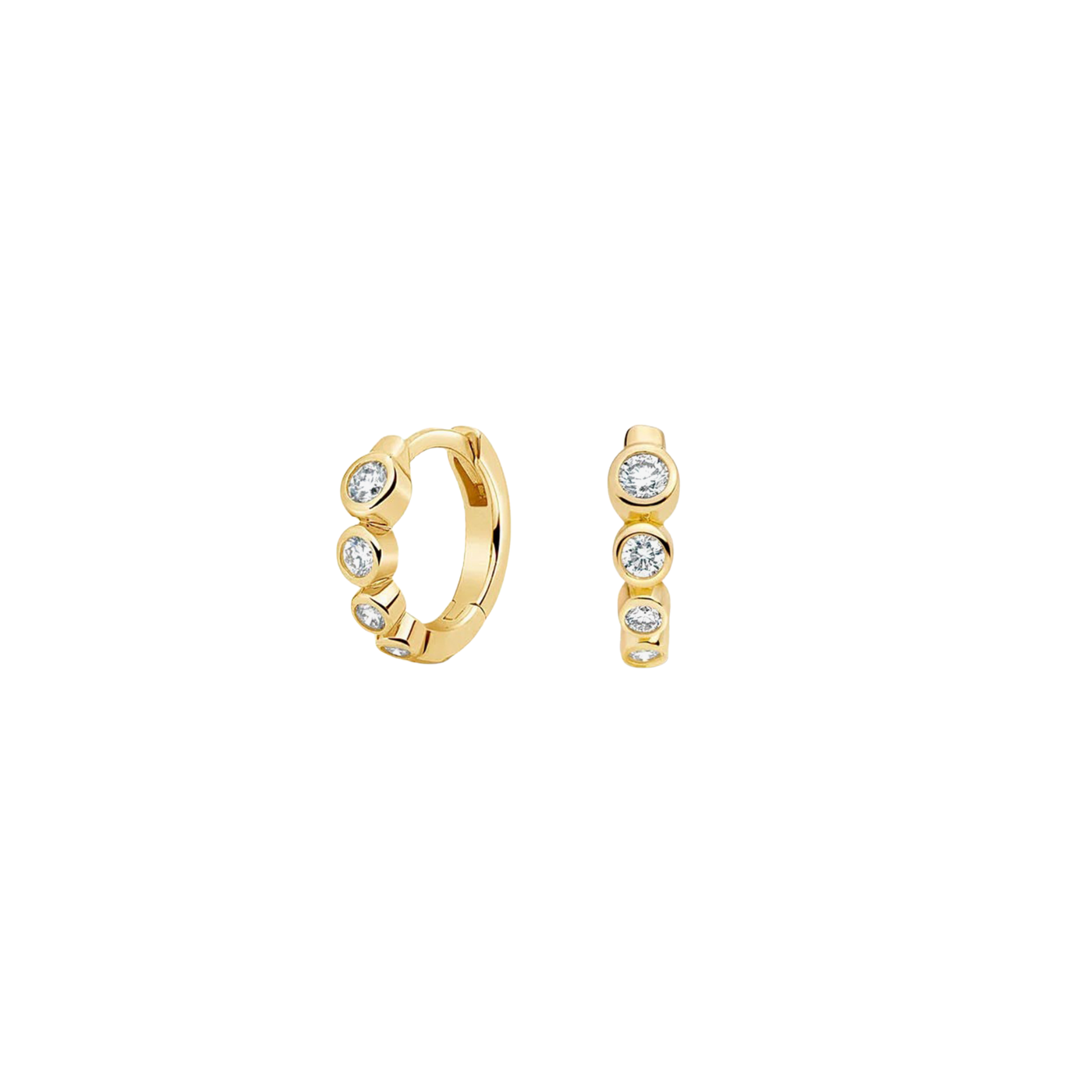 Gold crystal huggie hoop earrings worn on ear, minimalist jewellery